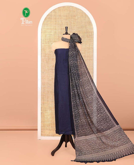 Navy Blue Material Chudidar Set, Subtly Woven with Pom-Pom Potli Neck Vichitra Silk Top, a Plain Santoon Bottom, Paired with Crushed Georgette Dupatta of Ajrakh Print and Mirror Work