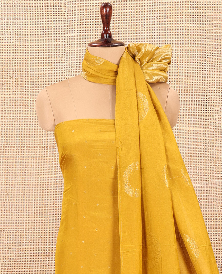 Yellow Mul Chanderi Material Chudidar Set, Subtly Sparkled with Buttas Top, a Matching Bottom, and a Circle Motif Woven Dupatta