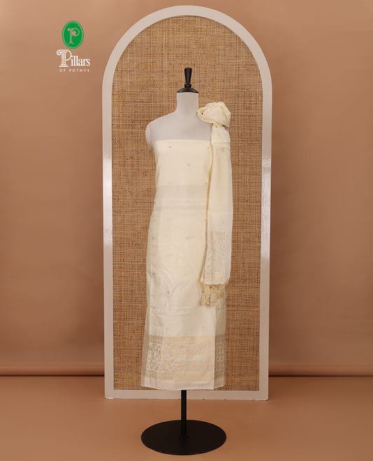 Kerala cream chudidar material, zari buttas & leaf motif taffeta silk top, plain cream santoon bottom & leaf zari designs dupatta