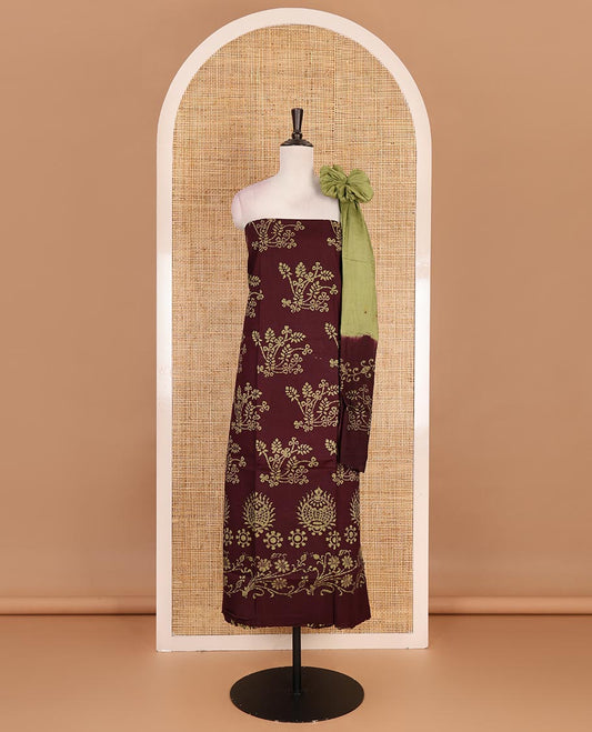 Brown cotton material chudidar set, batik style floral printed top, contrast plain bottom, and dupatta of floral batik print