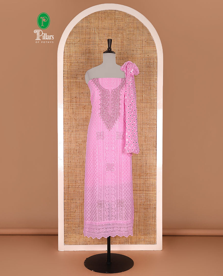 Pink material churidar set, stone work with Schiffli style embroidered georgette top, American Crape bottom, and polka dotted printed mirror work dupatta