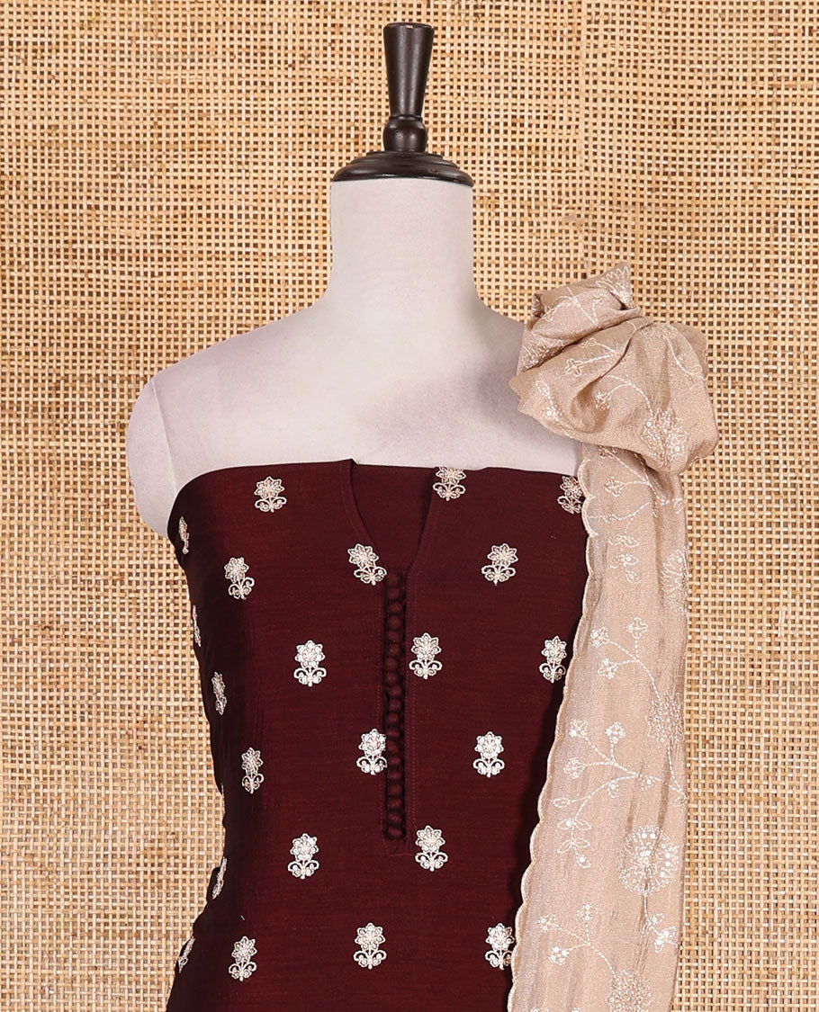 Dark brown Vichitra silk material churidar set, floral motifs embroidered top, contrast Santoon bottom, and floral vine thread embroidered scallop dupatta