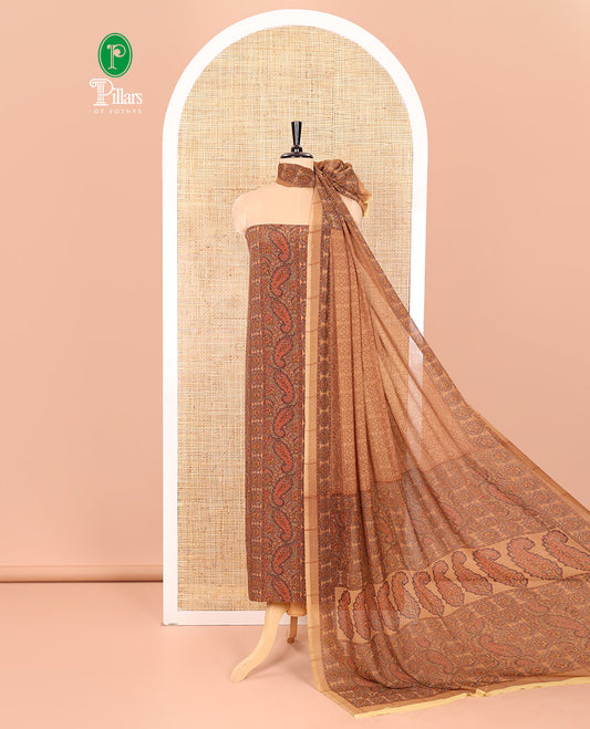 Light Mustard Material Chudidar Set Intricately Printed with Paisley Motifs on the Italian Crepe Top, Subtly Negative Printed Bottom, and Italian Crepe Dupatta of the Same Paisley Prints