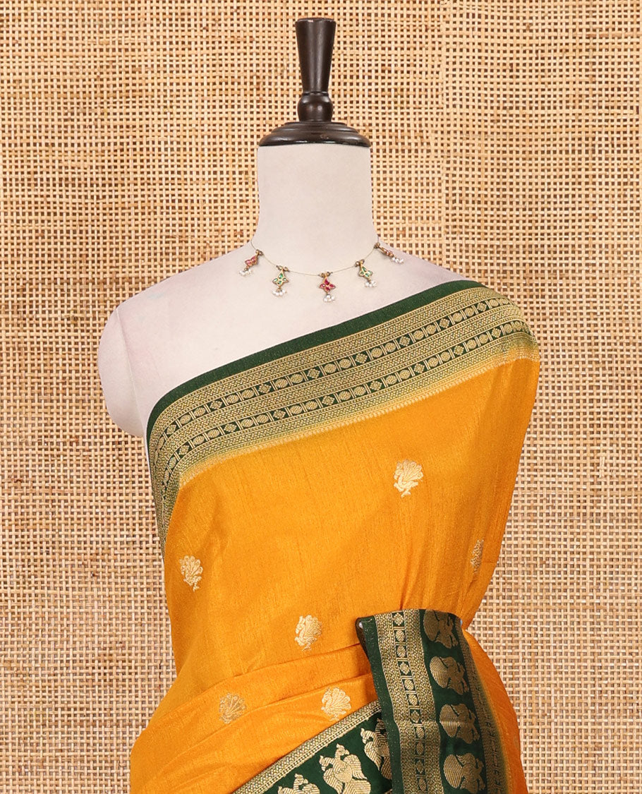Mustard peacock buttas dola silk saree, contrast rudraksham & iruthalai pakshi border, intricate pallu & contrast jacquard blouse
