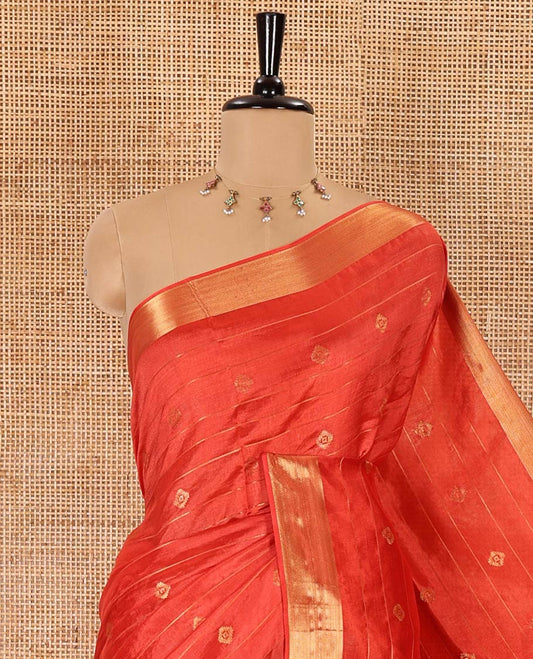 Red zari buttas and striped banana pith saree, bavanji border, zari striped pallu, and a matching blouse