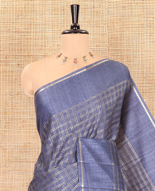 Grey zari checked fancy tussar silk saree, zari striped border, plain pallu, and a matching blouse