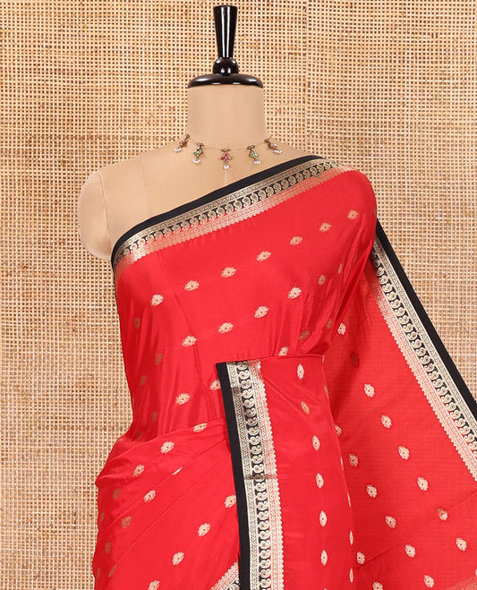 Red and Black Semi-Mysore Silk Saree, Adorned with Zari Buttas All Over Its Body, Complemented by a Contrast Traditional Zari Border of Paisleys, Pallu Steeped with Buttas, and Paired with a Contrast Blouse
