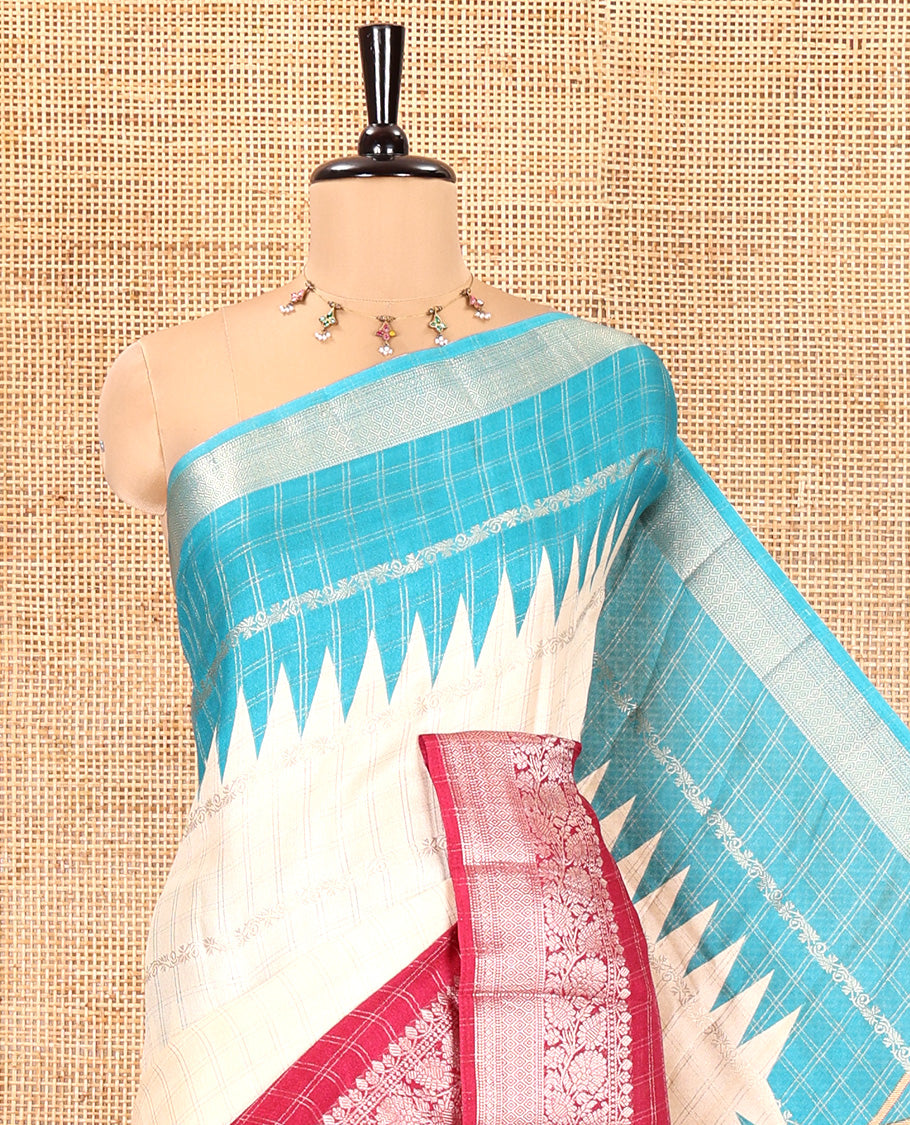 Off-White Fancy Georgette Saree, Woven with Zari Designs, Complemented by a Contrast Ganga-Jamuna Zari Temple Border of Traditional Designs, Pallu of Paisleys, and Paired with a Contrast Blouse
