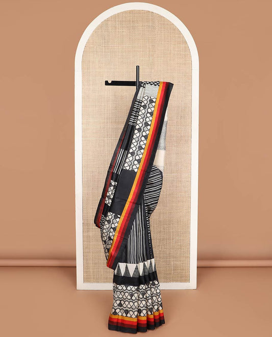 Black and white geometric printed silk saree with contrast border & floral design pallu