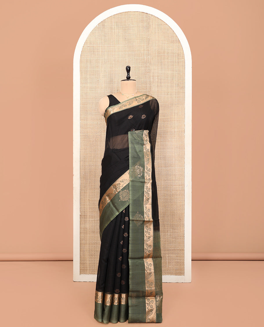 Black Silk Cotton Saree, Adorned with Zari Buttas, Complemented by a Contrast Floral-Peacock Zari Border, Grand Jaal Pallu, and a Contrast Blouse