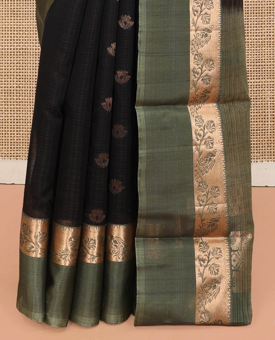 Black Silk Cotton Saree, Adorned with Zari Buttas, Complemented by a Contrast Floral-Peacock Zari Border, Grand Jaal Pallu, and a Contrast Blouse