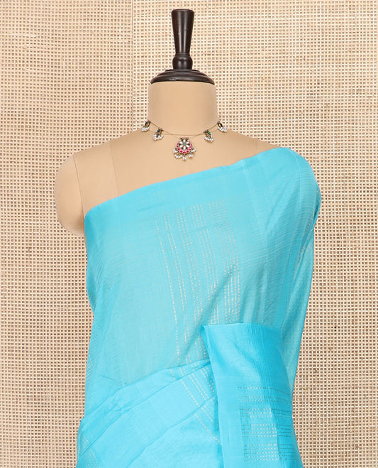 Borderless Blue Silk Cotton Saree Subtly Sparkled with Zari Stripes All Over the Body, Sparsely Woven Pallu of Zari Stripes, and Paired with a Matching Blouse