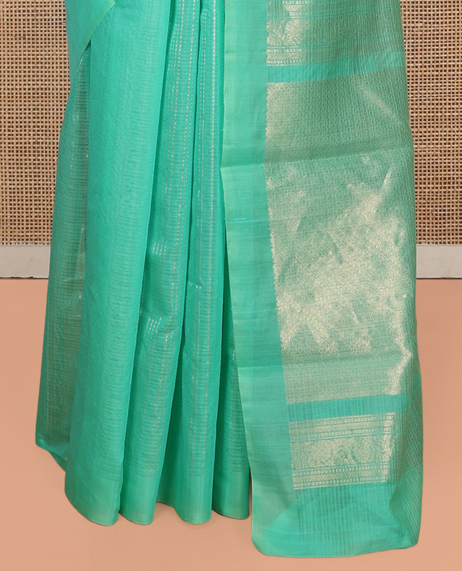 Borderless Turquoise Silk Cotton Saree, Accentuated with Zari Buttas and Stripes, Grand Pallu, and a Matching Blouse
