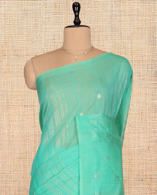 Borderless Turquoise Silk Cotton Saree, Accentuated with Zari Buttas and Stripes, Grand Pallu, and a Matching Blouse