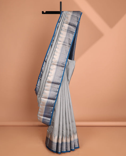 Light grey checked tussar saree with contrast traditional zari design border & chevron design pallu