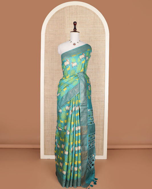 Blue tree and Pichwai cow printed tussar silk saree, bavanji border, and checked pallu