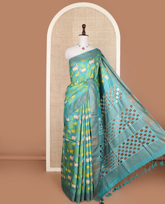 Blue tree and Pichwai cow printed tussar silk saree, bavanji border, and checked pallu