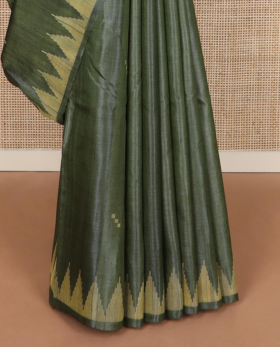 Green buttas tussar silk saree, temple border and pallu of stripes and temple motifs