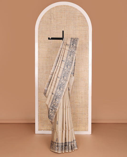 Sandal floral motifs printed tussar saree, featuring a self-border & pallu with Madhubani-style motifs in black dye