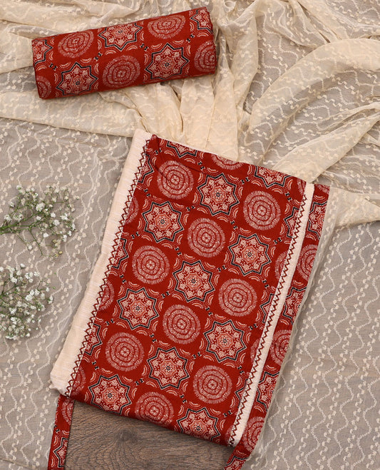Cream-red material chudidar set, Ajrakh printed patch neck work top, contrast Ajrakh printed bottom, and thread embroidered dupatta