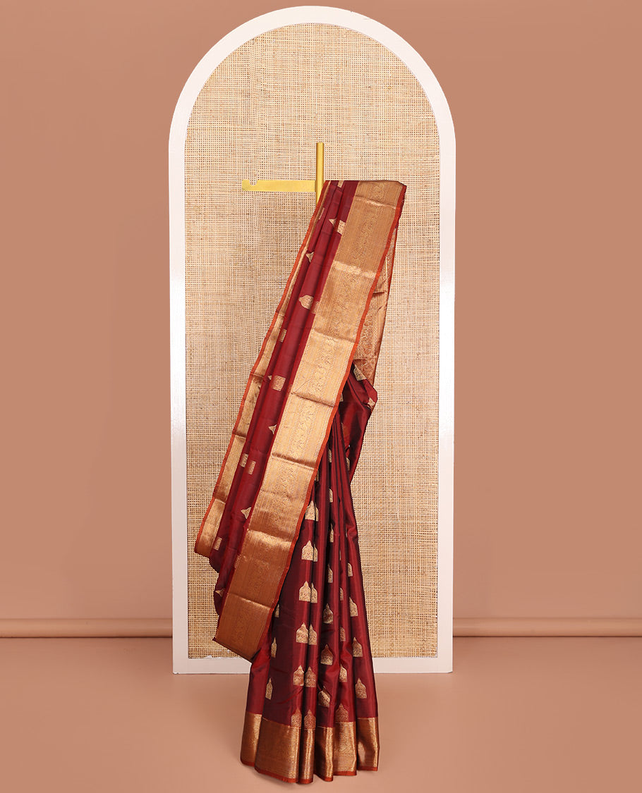 Maroon Vasundhara Lite-Silk Mix Saree, Detailed with Zari Buttas All Over Its Body, Highlighted by a Zari Border of Rekku, Kamalam, Kuyil Kann, Yaanai, and Mayil Designs, Grand Pallu of Jaal Designs, and Paired with a Contrast Blouse