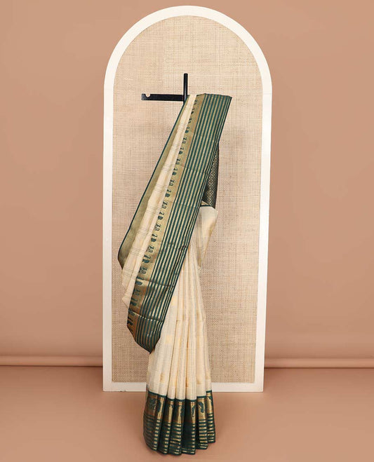 Cream buttas and checked Vasundhara silk mix saree, contrast border of thilakam, kathir, lavangam, kuyil kann, and Ram Sita kalyana designs, and jaal pallu