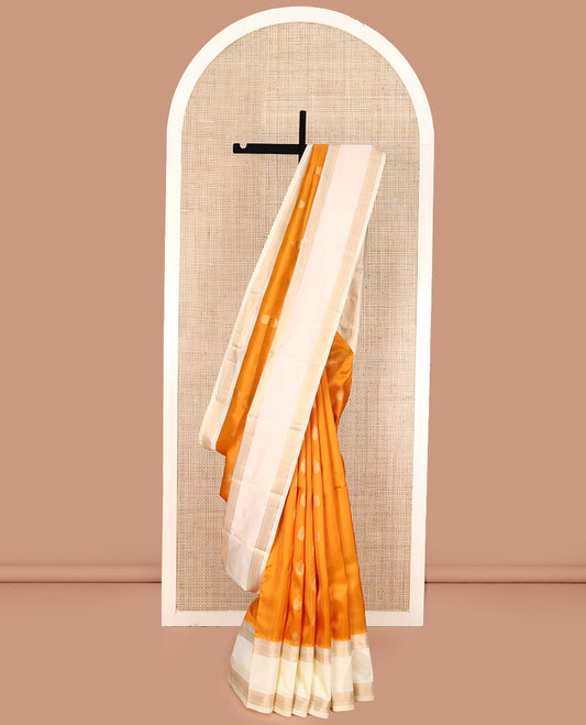 Orange Vasundhara Lite Silk Mix Saree, Decked Up with Zari Buttas All Over Its Body, Complemented by a Contrast Rettai Pettu Border, Grand Jaal-Patterned Pallu, and Paired with a Contrast Blouse