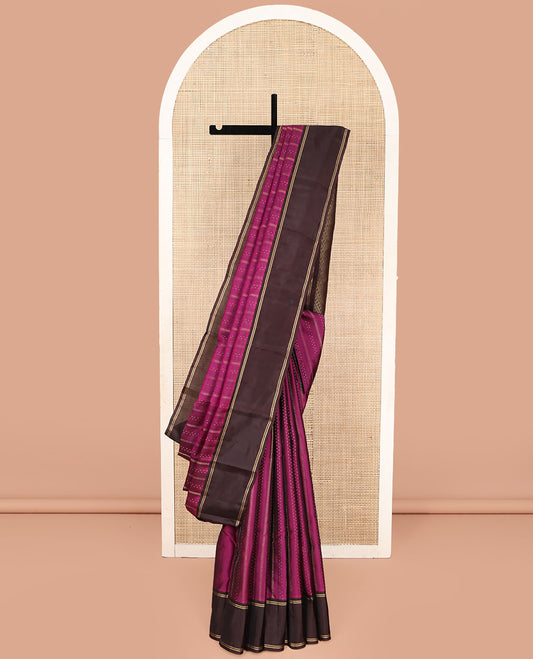 Purple Vasundhara Lite Silk Mix Saree, Meticulously Designed with Zari Buttas on Its Body, Complemented by a Contrast Border of Horizontal Zari Stripes, Sparsely Woven Jaal Pallu, and Paired with a Contrast Blouse