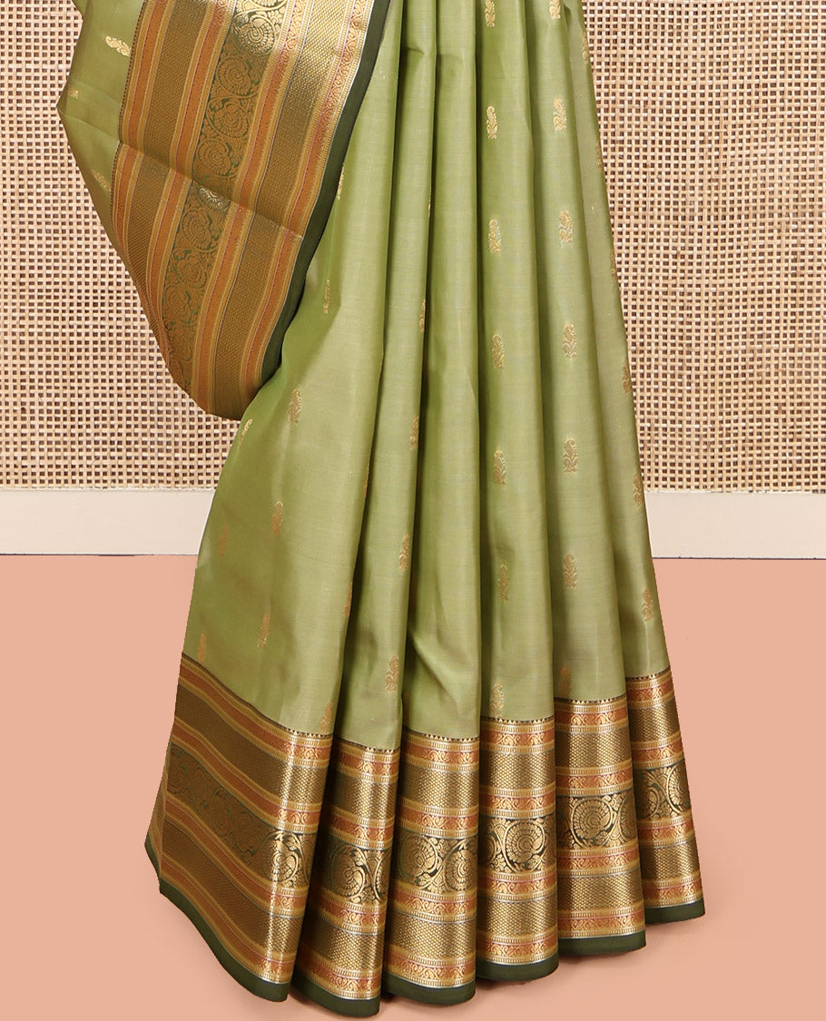 Green Vasundhara Lite Silk Mix Saree, Adorned with Zari Buttas, a Contrast Border of Rekku, Muthu, Kodi Visiry, and Mayil Kann, Jaal Pallu, and a Contrast Blouse