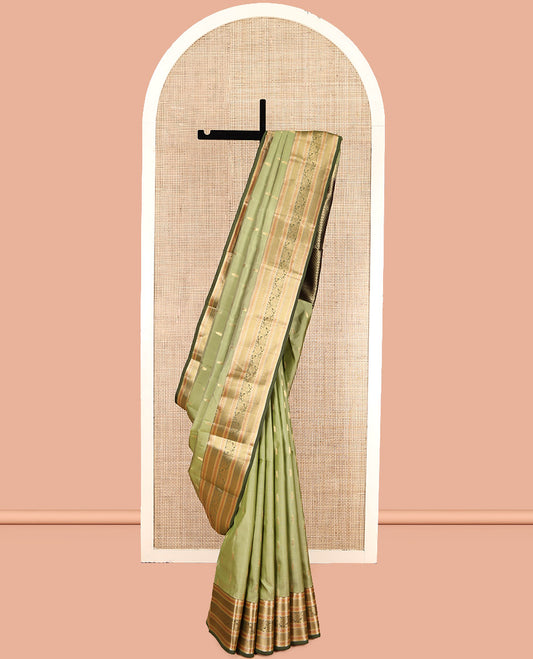 Green Vasundhara Lite Silk Mix Saree, Adorned with Zari Buttas, a Contrast Border of Rekku, Muthu, Kodi Visiry, and Mayil Kann, Jaal Pallu, and a Contrast Blouse