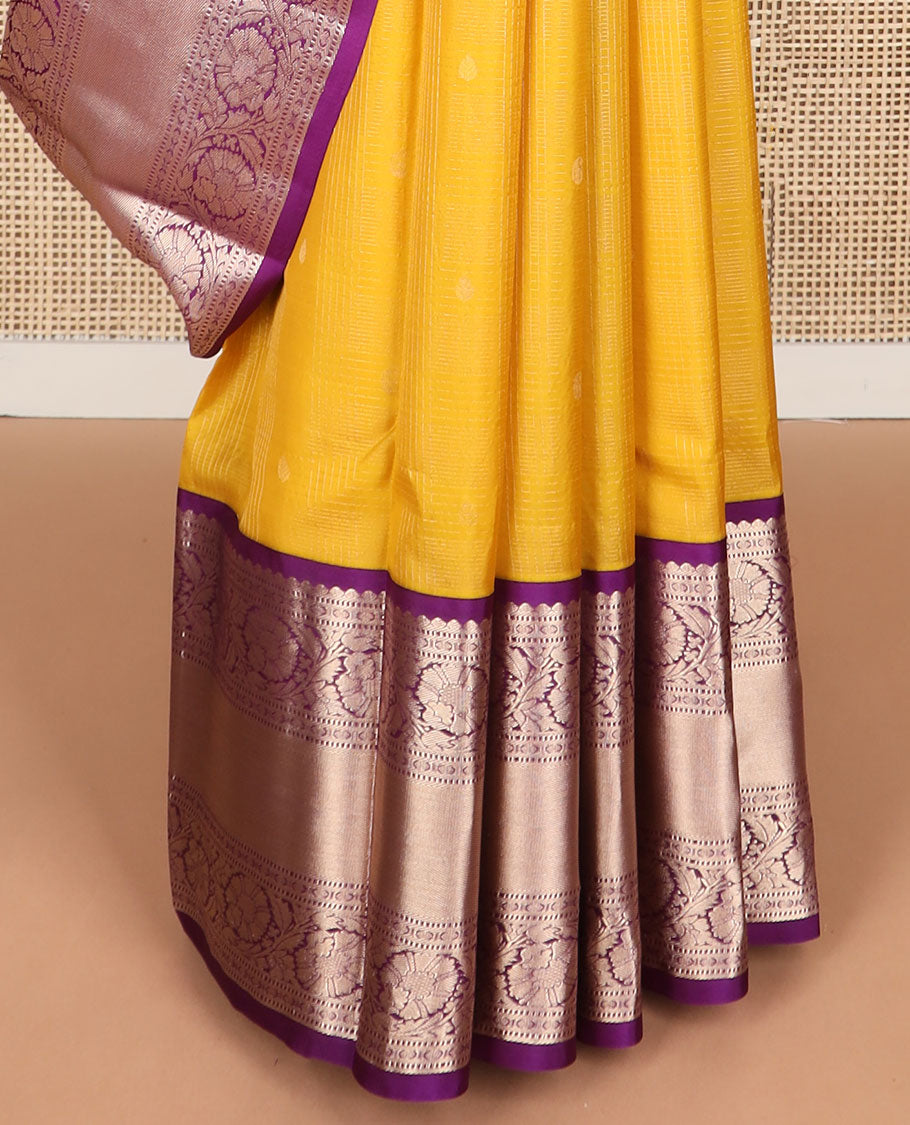 Yellow checked , buttas silk saree with contrast border of thilakam mokku, muthu, paun, kodi visiry design & zari design pallu