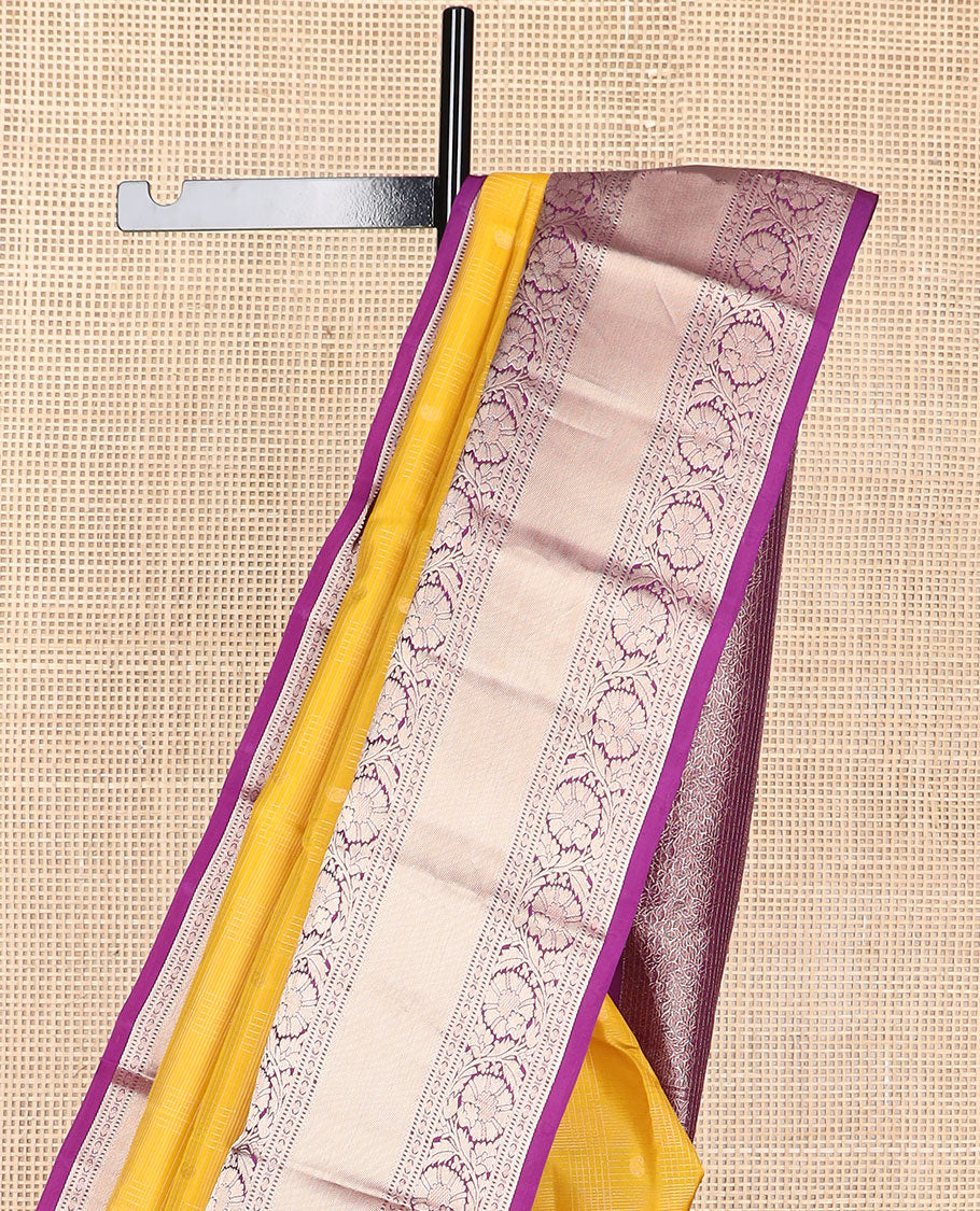 Yellow checked , buttas silk saree with contrast border of thilakam mokku, muthu, paun, kodi visiry design & zari design pallu