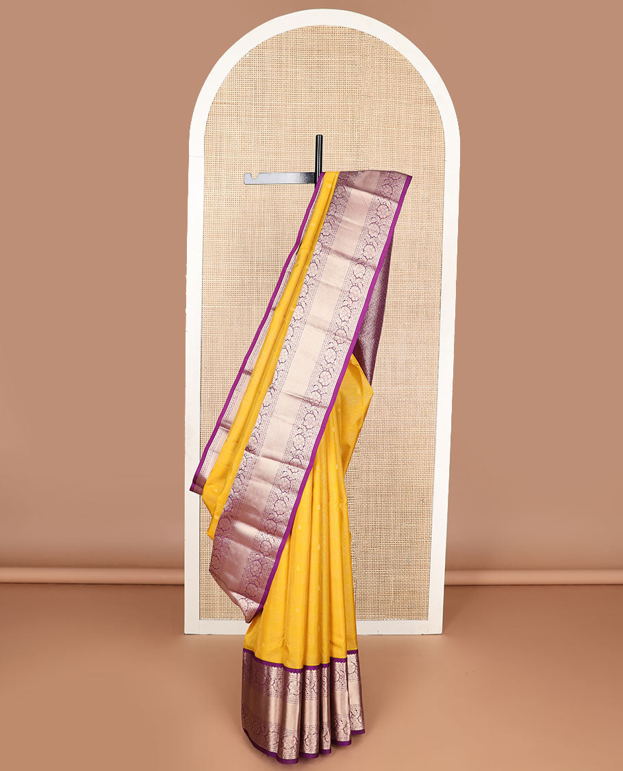 Yellow checked , buttas silk saree with contrast border of thilakam mokku, muthu, paun, kodi visiry design & zari design pallu