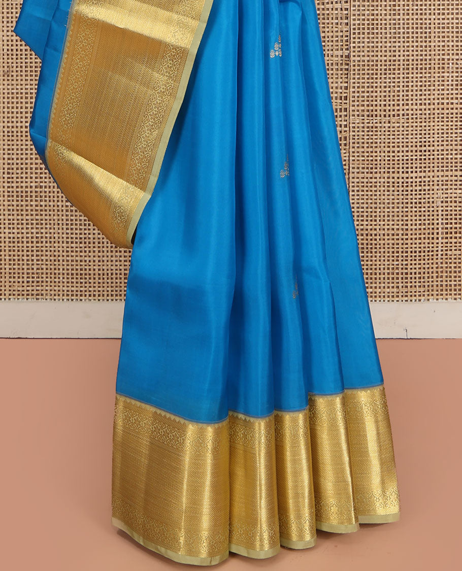 Blue Vasundhara Silk Saree, Decked Up with Zari Buttas  All Over Its Body, Complemented by Contrast Border of Traditional Designs, Pallu of Floral Designs, and Paired with a Contrast Blouse