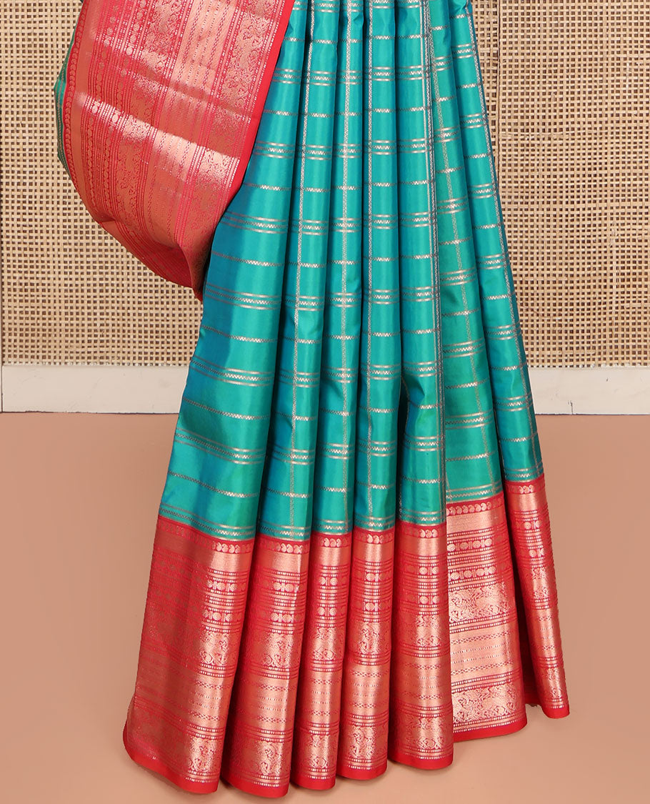 Green Vasundhara Silk Saree, Enriched with Zari Checked Designs All Over Its Body, Complemented by a Contrast Border of Manga, Muthu, Banaras, Rudraksham, and Yaali Designs, Grand Jaal Pallu, and Paired with a Contrast Blouse