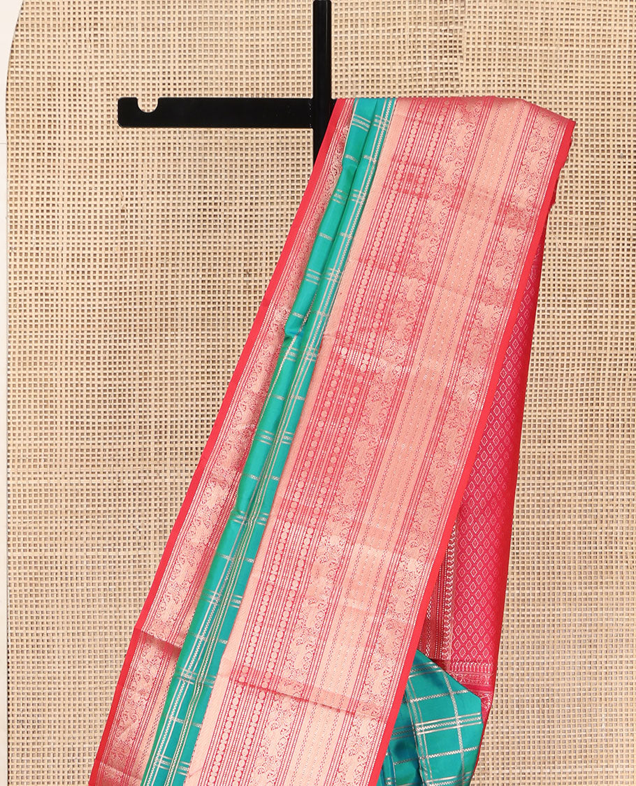 Green Vasundhara Silk Saree, Enriched with Zari Checked Designs All Over Its Body, Complemented by a Contrast Border of Manga, Muthu, Banaras, Rudraksham, and Yaali Designs, Grand Jaal Pallu, and Paired with a Contrast Blouse