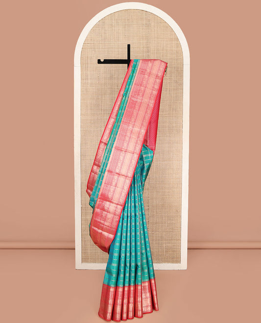 Green Vasundhara Silk Saree, Enriched with Zari Checked Designs All Over Its Body, Complemented by a Contrast Border of Manga, Muthu, Banaras, Rudraksham, and Yaali Designs, Grand Jaal Pallu, and Paired with a Contrast Blouse