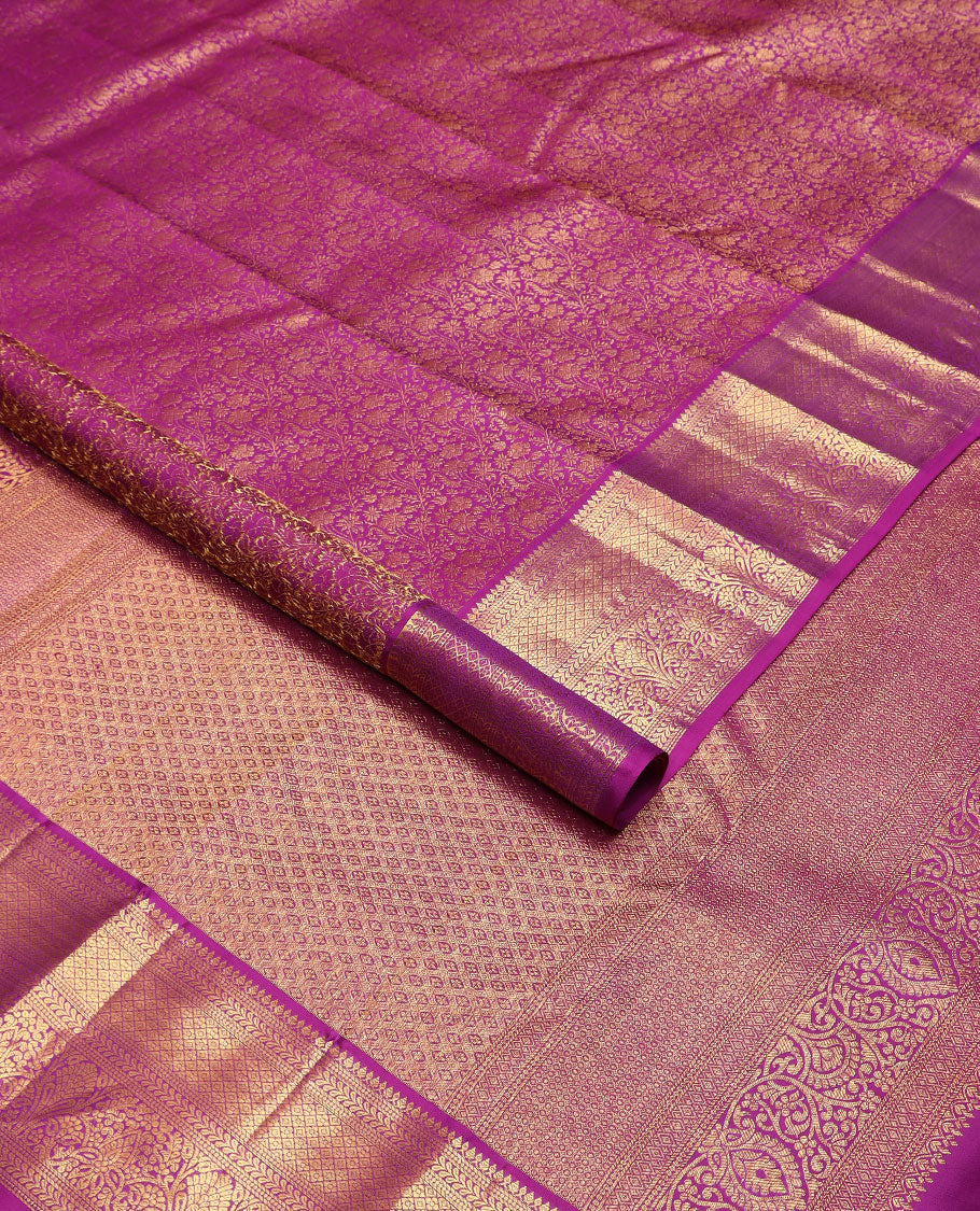 Purple floral jacquard Kanchipuram wedding silk saree, traditional zari border, and pallu of jaal design
