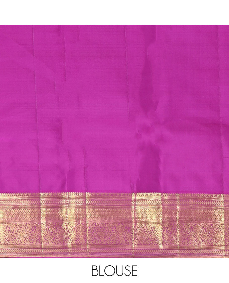 Purple floral jacquard Kanchipuram wedding silk saree, traditional zari border, and pallu of jaal design
