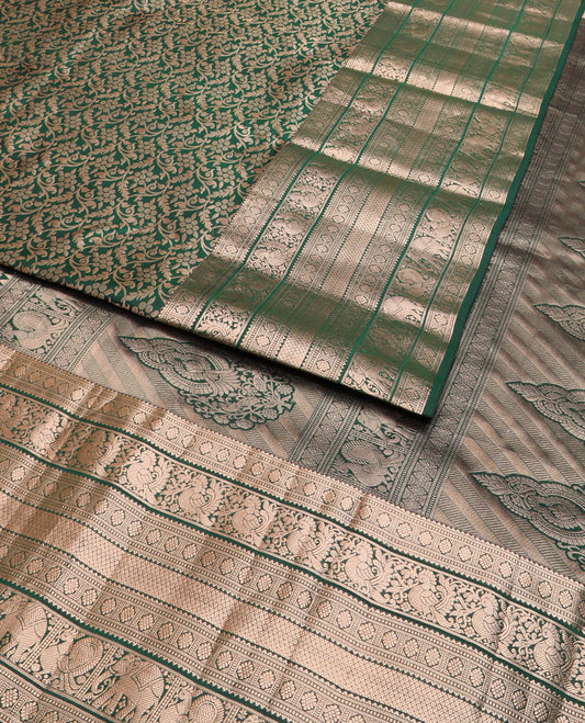 Green jacquard Kanchipuram wedding silk saree, zari border of rekku, muthu, laddu kamalam, mayil, mayil kann, and yaanai, intricate motifs zari woven pallu
