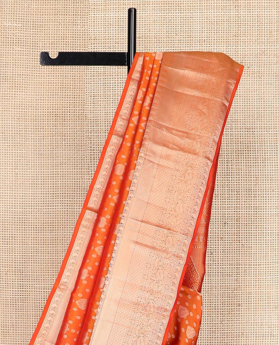 Orange zari buttas Kanchipuram wedding silk saree, zari border of thilakam mokku, chakram, kathir, manga, kuyil kann, jaal ,and zari designs, and intricate pallu