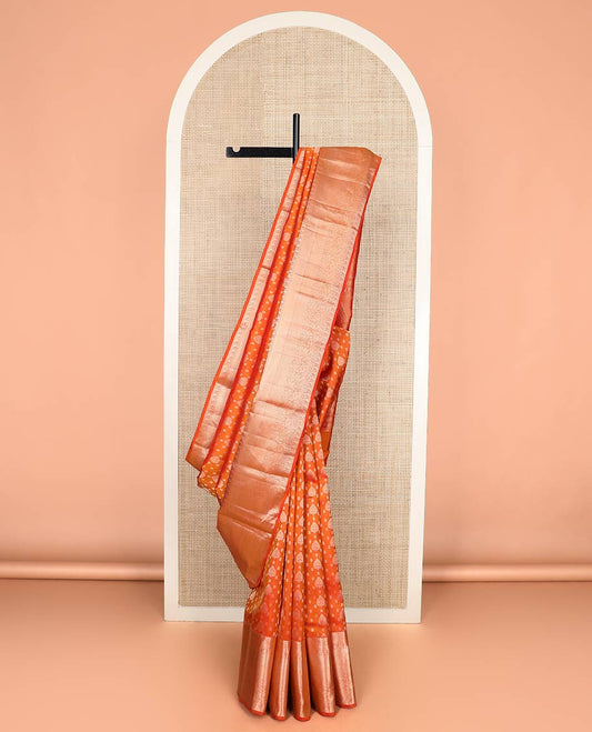 Orange zari buttas Kanchipuram wedding silk saree, zari border of thilakam mokku, chakram, kathir, manga, kuyil kann, jaal ,and zari designs, and intricate pallu