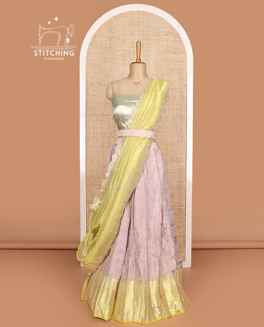 Pink art silk half-saree, floral vine with contrast traditional border skirt, brocade blouse, scallop embroidered dhavani, and detachable belt