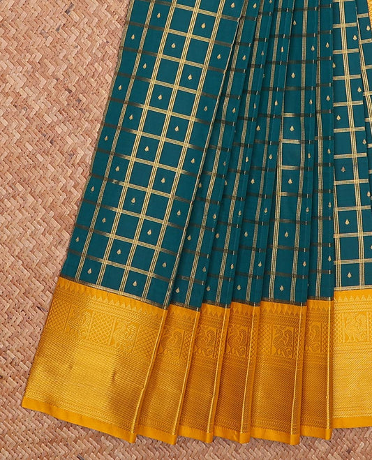 Peacock blue butta enclosed checked gift saree, contrast traditional zari design border, and jaal pallu