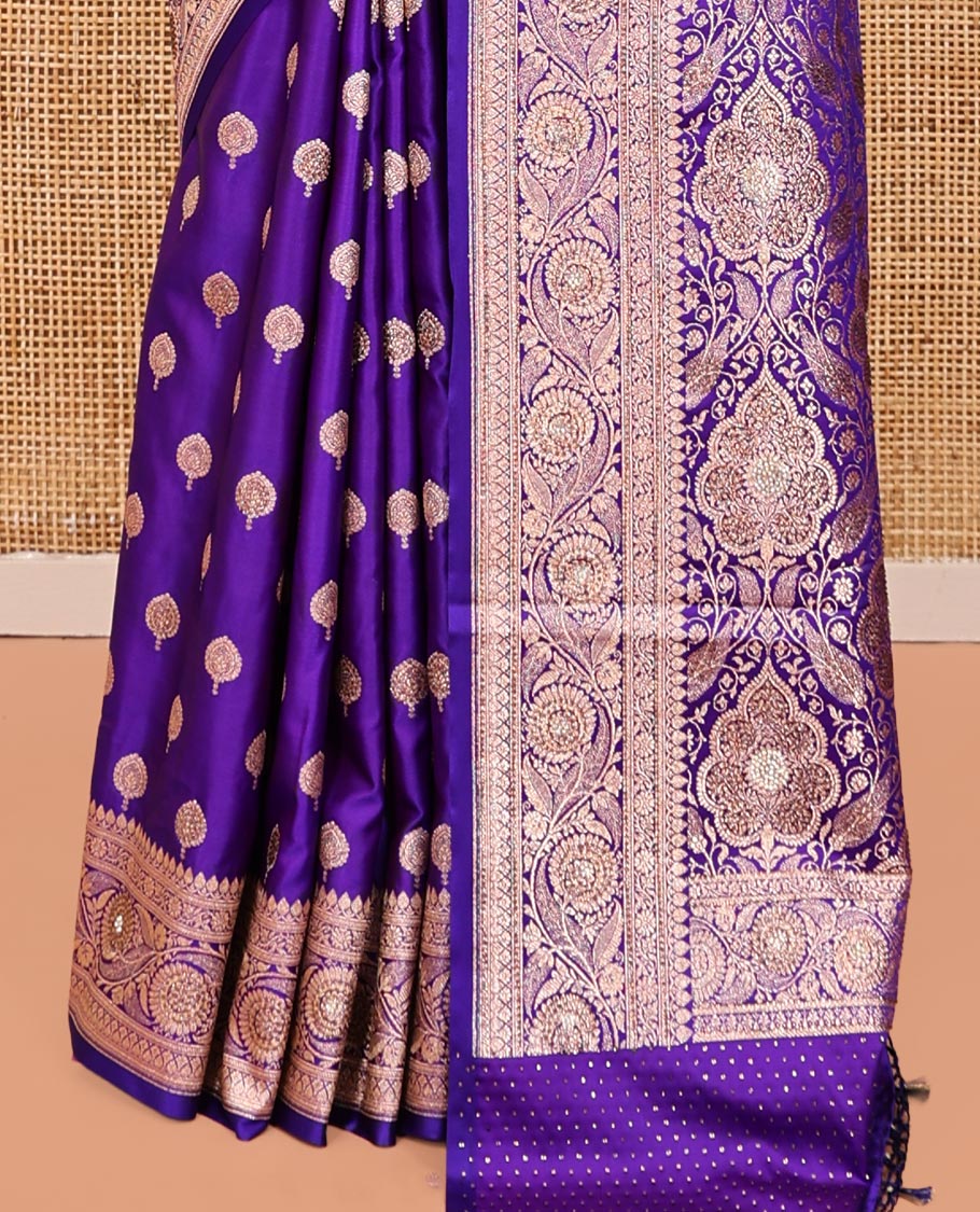 Violet Banarasi Satin Saree, Elevated with Zari Buttas, a Floral Creeper Border, Intricate Stonework Pallu, and a Matching Blouse