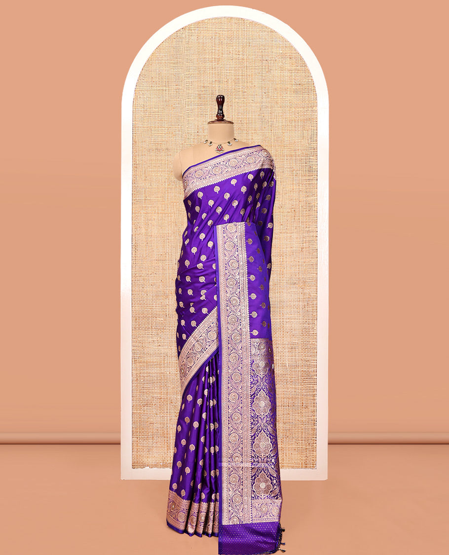 Violet Banarasi Satin Saree, Elevated with Zari Buttas, a Floral Creeper Border, Intricate Stonework Pallu, and a Matching Blouse