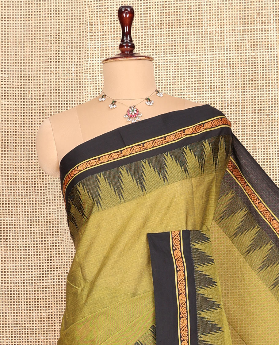 Green Plain Chettinad Cotton Saree, Complemented by a Contrast Temple Traditional Zari Border, Striped Pallu, and a Matching Blouse