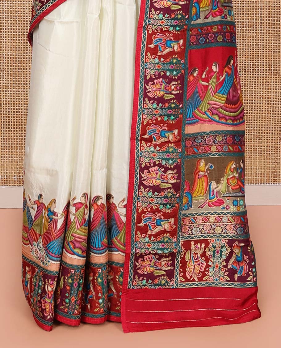 White Dola Silk Saree, Creatively Printed with Human Figurines on Its Body, Complemented by a Contrast Human Figurines Border, Pallu Depicts Colorful Human Figurines, and Paired with a Matching Blouse