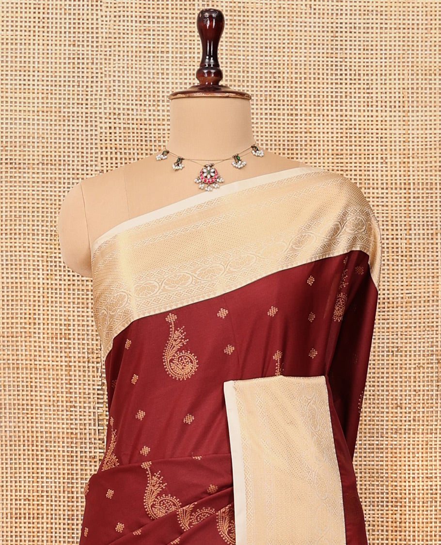 Maroon-Cream Budget Silk Saree, Adorned with Kolam and Floral Buttas, a Contrast Traditional Zari Border, Grand Pallu, and a Contrast Blouse
