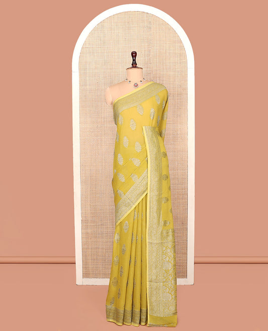 Yellow Georgette Saree, Elevated with Buttas, Highlighted by a Traditional Border, Floral Jaal Pallu, and a Matching Blouse